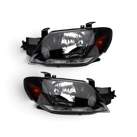MITSUBISHI OUTLANDER 2003-2006 FOCOS DELANTEROS FONDO NEGRO